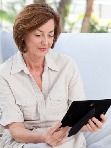 Woman looking at her photo